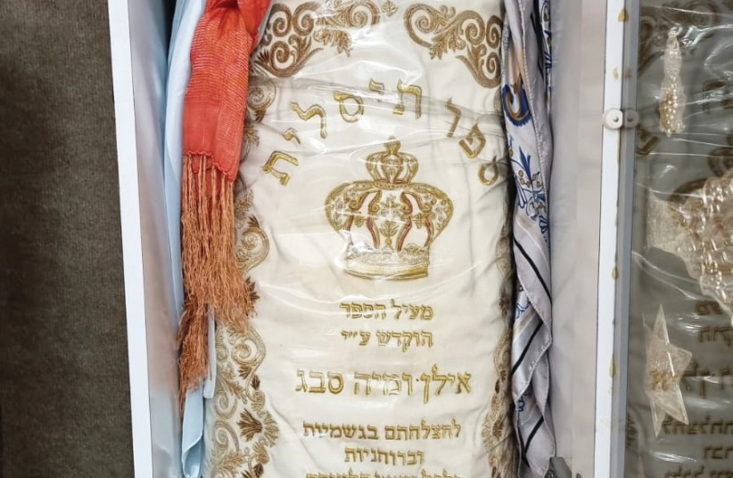  THE TISLIT Torah scroll. (credit: RAMI IVGY)