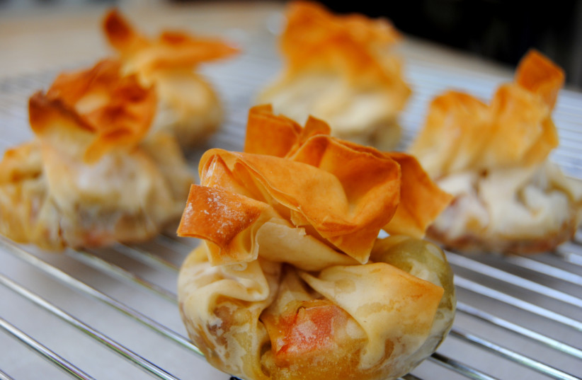  Filo dough stuffed with sautéed chicken and vegetables. (credit: PASCALE PEREZ-RUBIN)