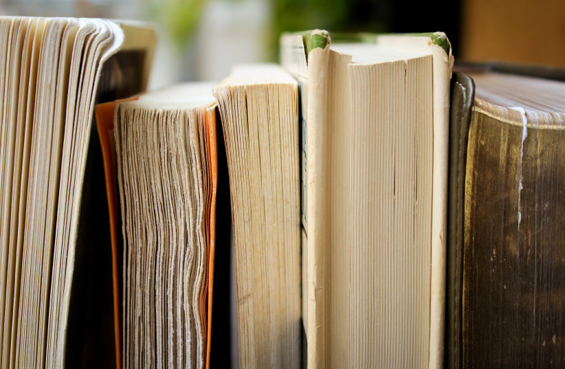  I KEPT avoiding the battered paperback with the cover half-torn off.  (photo credit: SYD WACHS/UNSPLASH)