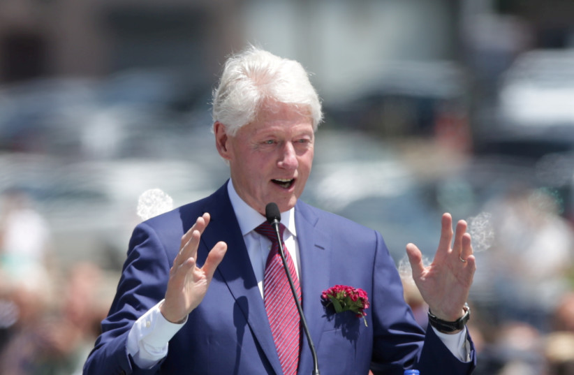  Former US President Bill Clinton delivers a speech during the 20th anniversary of the Deployment of NATO Troops in Kosovo in Pristina, Kosovo June 12, 2019. (photo credit: REUTERS/FLORION GOGA/FILE PHOTO)