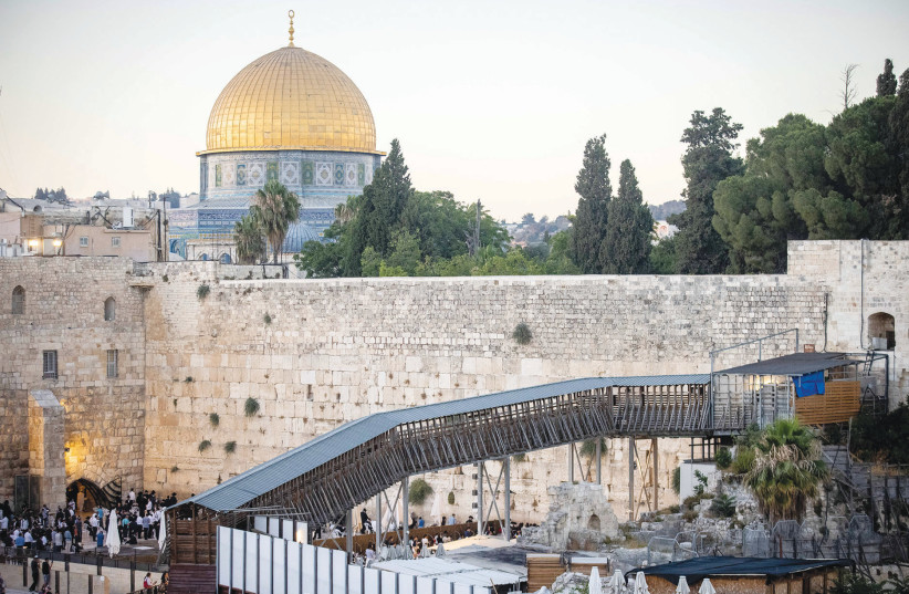 THE MUGHRABI Bridge leading up to the Temple Mount compound, with the Western Wall and Dome of the Rock seen behind, in Jerusalem’s Old City.  (credit: YONATAN SINDEL/FLASH90)
