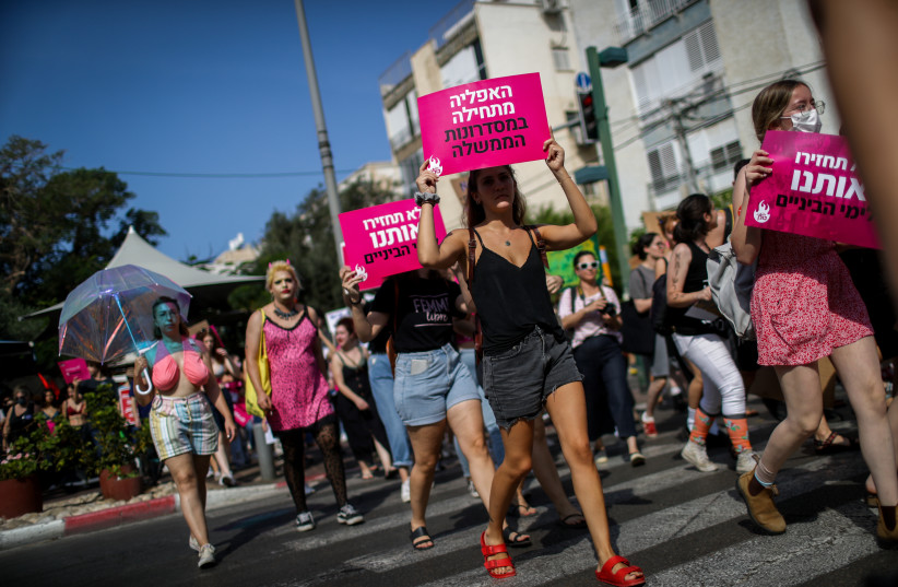  Israelis take part in the annual SlutWalk march in central Tel Aviv, on October 15, 2021 (credit: FLASH 90)