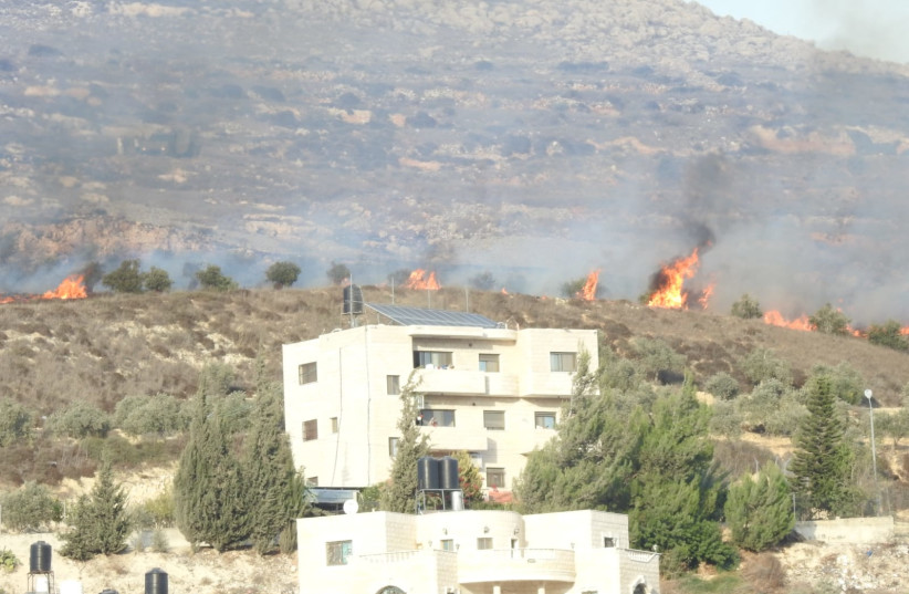  Fire started by Israeli extremists near Palestinian village of Burin, October 16, 2021 (photo credit: YESH DIN)