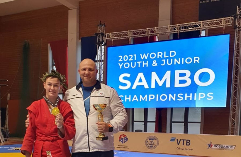  Elizabeth Kovalev with coach Pavel Musin at World Youth and Junior Sambo Championships held in Thessaloniki, Greece– October 16 2021 (credit: SHAI GEIZINGER)