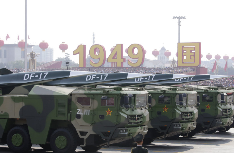  Military vehicles carrying hypersonic missiles DF-17 travel past Tiananmen Square during the military parade marking the 70th founding anniversary of People's Republic of China, on its National Day in Beijing, China October 1, 2019. (credit: REUTERS/JASON LEE)