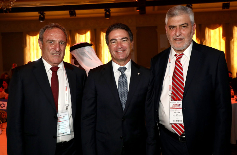 Bank Hapoalim Chairman, Robert Krupik, Former Mossad chief Yossi Cohen, Bank Hapoalim CEO Dov Kotler (photo credit: SIVAN FEIJ)