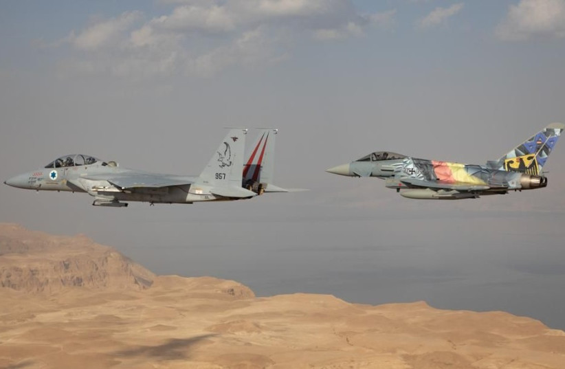 IAF Commander Maj.-Gen. Amikam Norkin in a "Baz" F-15 fighter jet, alongside an "Adir" F-35, with Luftwaffe (German Air Force) Inspector Lt.-Gen. Ingo Gerhartz in the "Eagle Star" Eurofighter, painted with the Israeli and German flags (photo credit: IDF SPOKESPERSON'S UNIT)