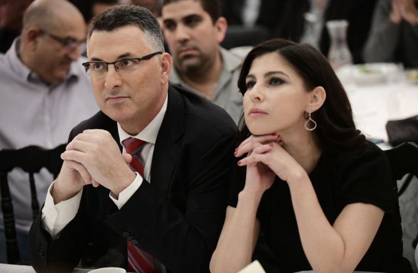  Justice Minister Gideon Saar and his wife Geula attend an event with Saar supporters after losing in the elections for the Likud leadership, in Or Yehuda, January 2, 2020. (photo credit: TOMER NEUBERG/FLASH90)
