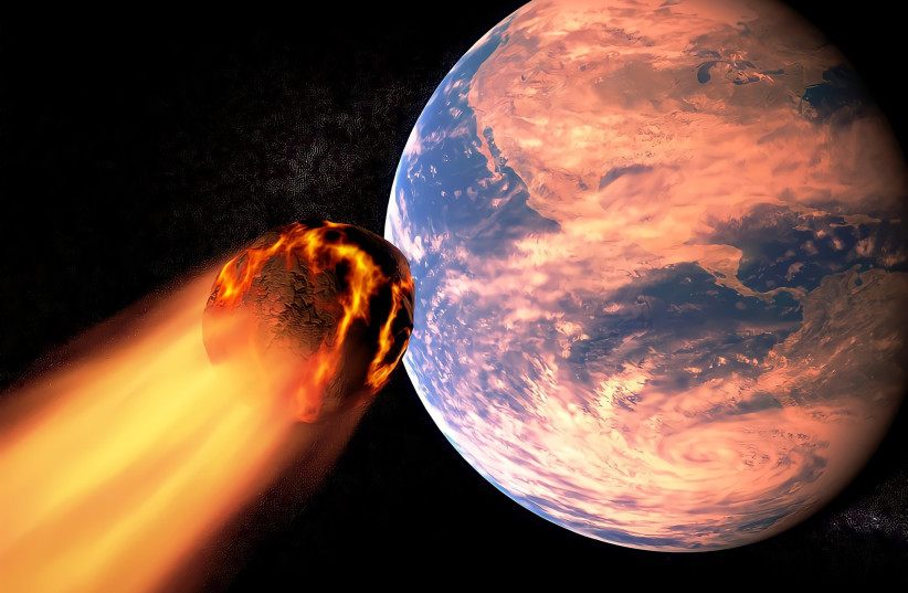  An asteroid is seen heading towards the planet in this artistic rendition. (photo credit: PIXABAY)