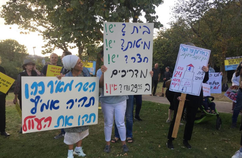  Parents protest the condition for adults with Autism in Israel. (photo credit: HANNAH BROWN)