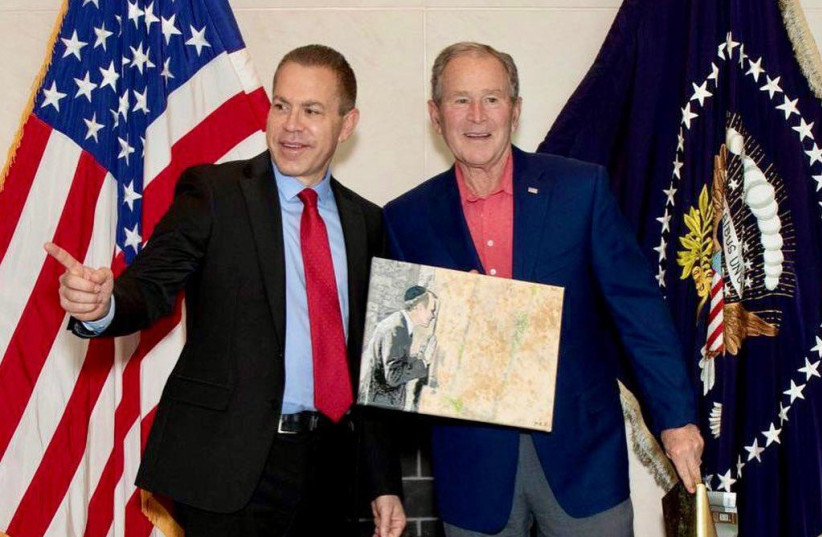  Former US President George W. Bush and Gilad Erdan (photo credit: MEIR COHEN)