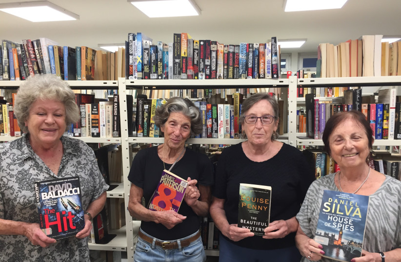  HOLDING SOME of their favorite books: Helen Frenkley (left) with Marcia Greenfeld, Margie Lewis and Judy Grossman. (photo credit: DIANA BLETTER)
