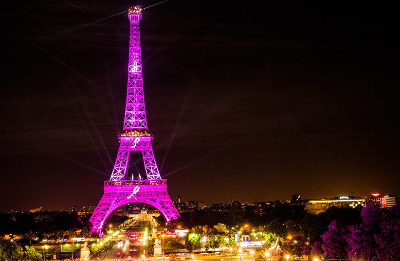  THE EIFFEL Tower is lit up with the signature pink ribbon in honor of Breast Cancer Awareness Month. (credit: Wikimedia Commons)