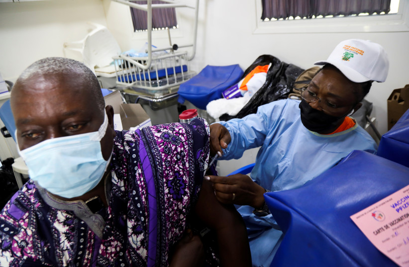  GETTING VACCINATED in Abidjan, Ivory Coast, September 23. (credit: Luc Gnago/File/Reuters)
