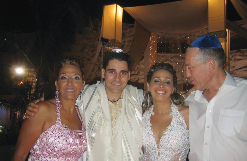  RACHEL Ohana and Avi Rivkind stand on either side of the happy couple at Shimon and Avia’s wedding. (photo credit: Courtesy Ohana family)