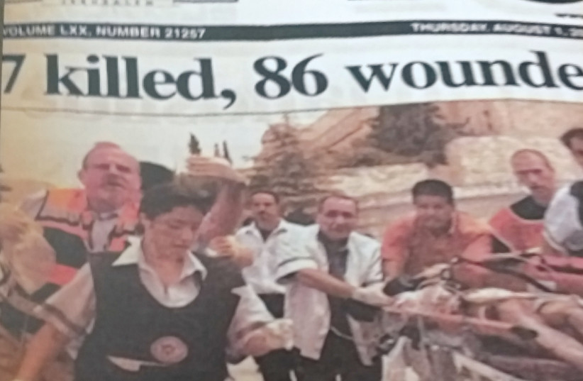 PICTURED ON the ‘Post’ front page responding to a deadly bombing at the Hebrew University, July 31, 2002. (credit: STUART GHERMAN)