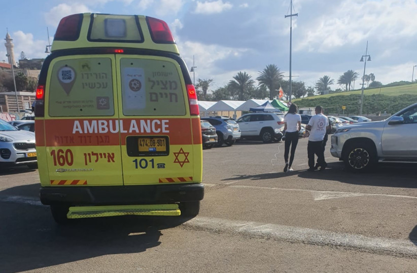  An ambulance is shown at the scene of a shooting in Jaffa on October 23, 2021 (credit: MAGEN DAVID ADOM)