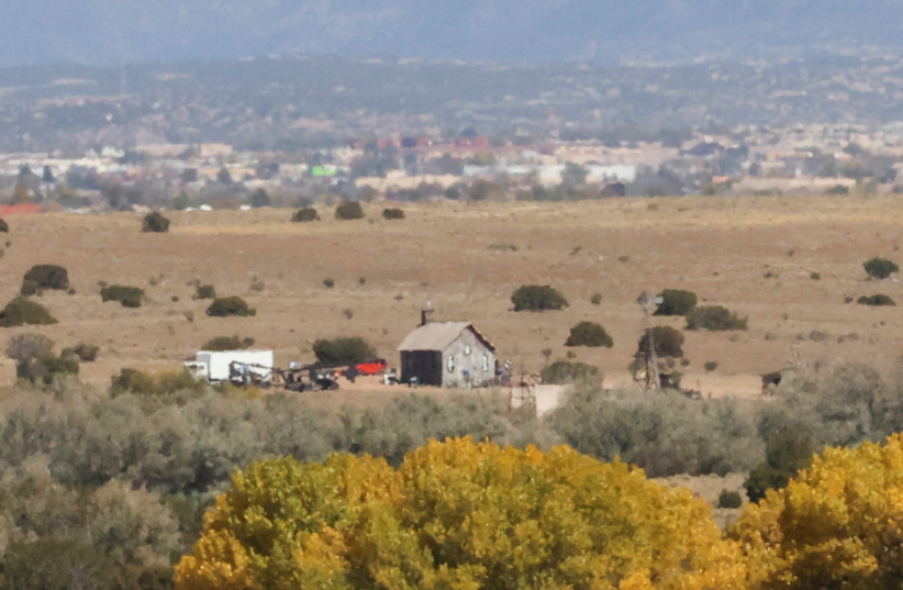  The film set of ''Rust'', where Hollywood actor Alec Baldwin fatally shot a cinematographer and wounded a director when he discharged a prop gun, is seen from a distance, in Santa Fe, New Mexico, US, October 23, 2021.  (credit: REUTERS/KEVIN MOHATT)