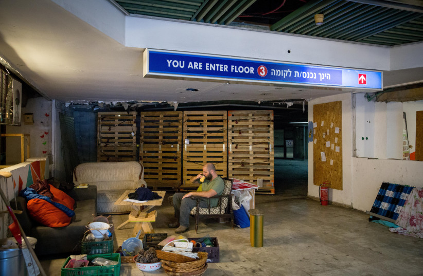  Members of the Onya Collective seen during a cleaning up day at "the Rampa", a space in the Central Bus Station in Tel Aviv, they have cleaned up and opened up for the surrounding community to enjoy. February 02, 2018. (photo credit: MIRIAM ALSTER/FLASH90)