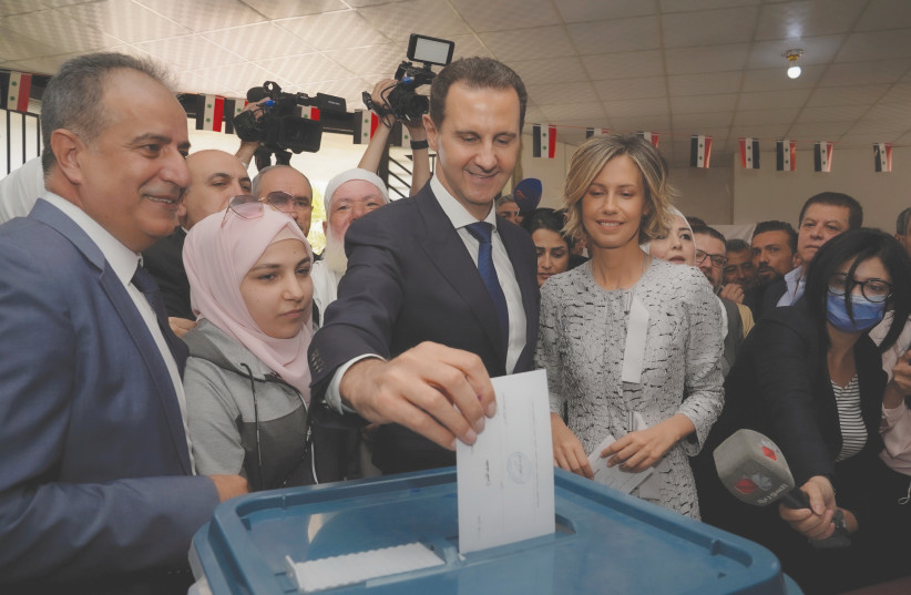 SYRIAN PRESIDENT Bashar Assad casts his vote in the country’s presidential election in May. (credit: SANA/REUTERS)