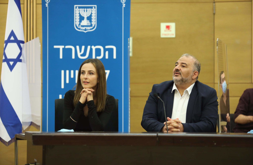  Social Equality Minister Meirav Cohen and Ra'am head Mansour Abbas are seen at the Knesset in Jerusalem, on October 25, 2021. (photo credit: MARC ISRAEL SELLEM/THE JERUSALEM POST)