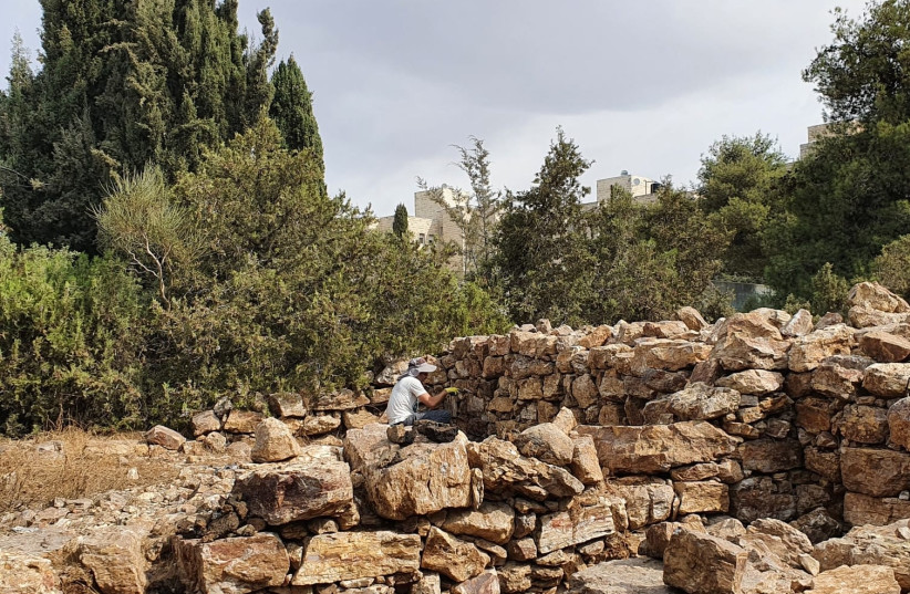  Conservation work in  the fortress on the French Hill.  (credit: YAEL KALMAN/ISRAEL ANTIQUITIES AUTHORITY)
