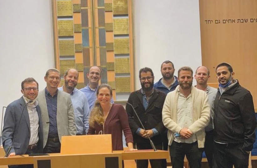  THE WRITER at her synagogue in New York with visiting Orthodox rabbis from the Yeshivat Chovevei Torah Beit Midrash for Rabbinic Leadership in Israel. (photo credit: Courtesy)