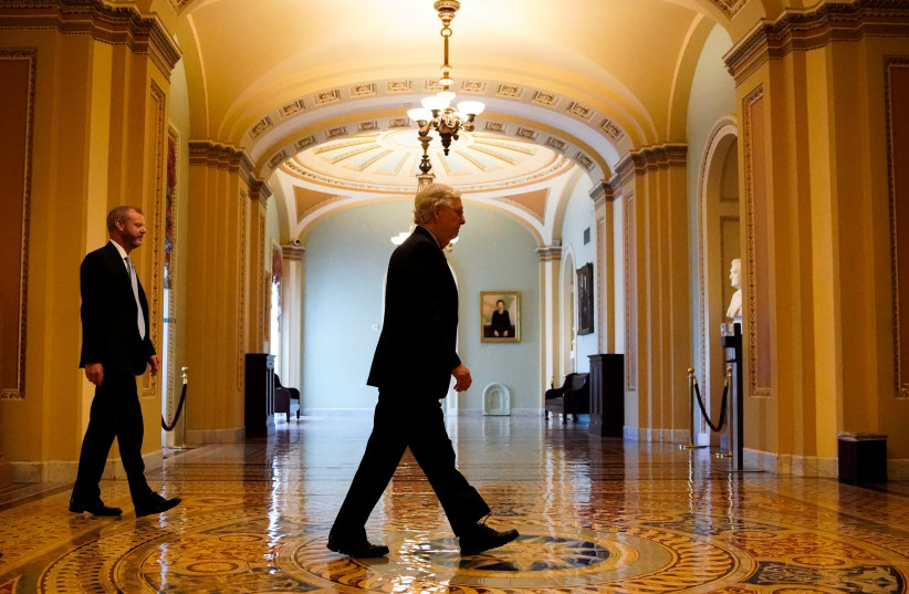  US Senate Minority Leader Mitch McConnell (R-KY) walks to the Senate floor at the US Capitol in Washington, US, October 21, 2021. (photo credit: REUTERS/ELIZABETH FRANTZ)