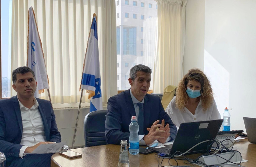  Communications Minister Yoaz Hendel (center) speaking in the social media regulation committee on October 28, 2021 (credit: Courtesy)
