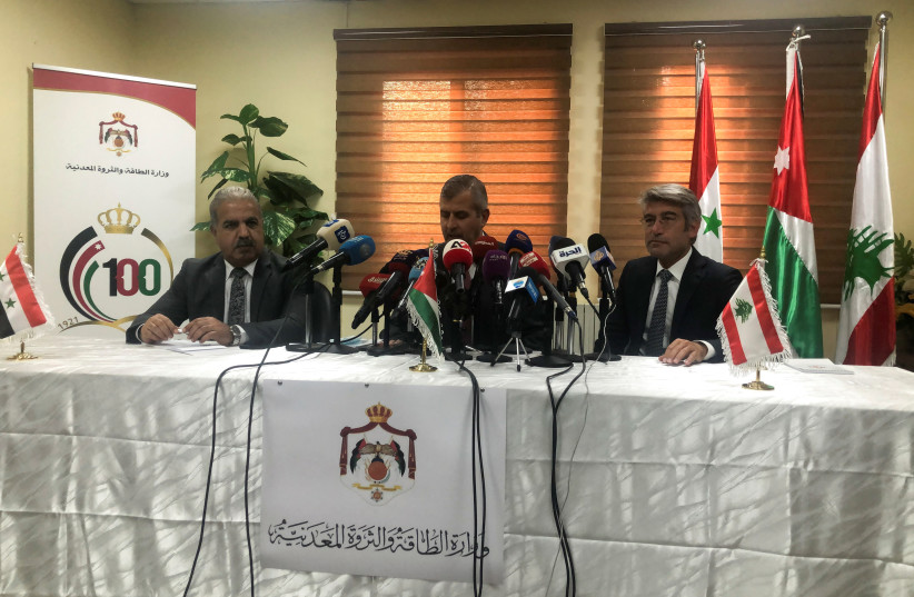  Syrian Electricity Minister Ghassan al-Zamil attends a news conference with Jordan's Minister of Energy and Mineral Resources Saleh Ali Hamed Al-Kharabsheh and Lebanon's Energy Minister Walid Fayad in Amman, Jordan October 28, 2021 (credit: REUTERS/JEHAD SHELBAK)