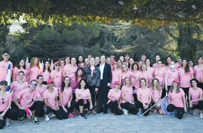 MICHAL AND President Isaac Herzog with women of Gam Ani Ratza (‘I also run’) to raise breast cancer awareness. (credit: Levi Dvish)