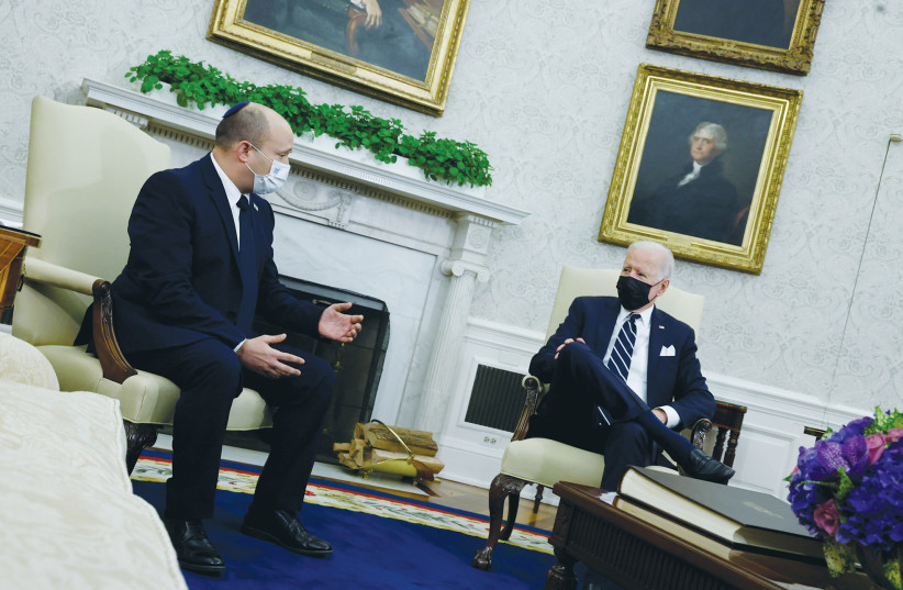 PRIME MINISTER Naftali Bennett meets with US President Joe Biden in the Oval Office in August. (credit: JONATHAN ERNST/REUTERS)