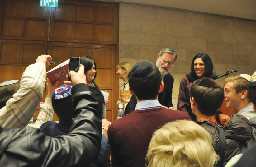  Rabbi Sacks with Gila Fine (credit: Courtesy)