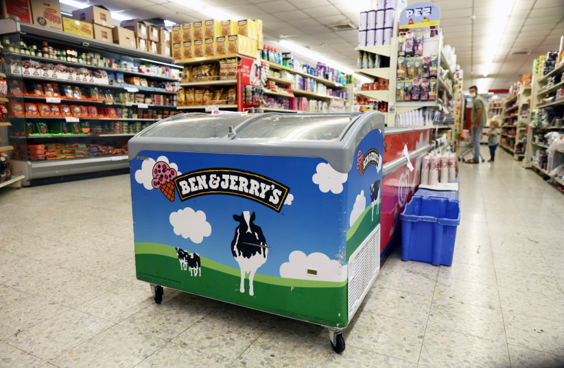  aA refrigerator bearing the Ben & Jerry's logo is seen at a food store in the Jewish settlement of Efrat July 20, 2021. (photo credit: REUTERS/RONEN ZEVULUN)