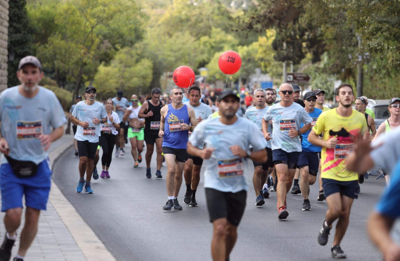  Runners in Jerusalem's 10th Annual Marathon, October 29, 2021 (credit: MARC ISRAEL SELLEM/THE JERUSALEM POST)