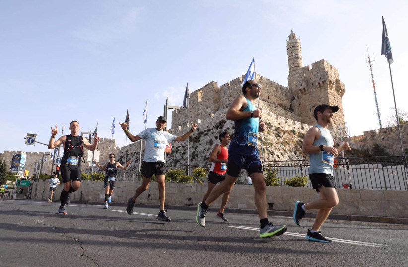   RUNNERS TAKE PART in Jerusalem's 10th Annual Marathon, October 29, 2021 (credit: MARC ISRAEL SELLEM/THE JERUSALEM POST)