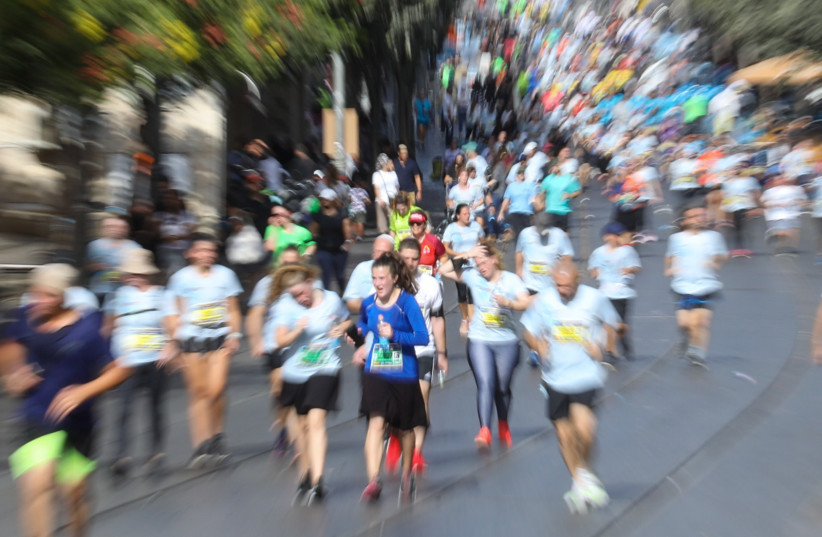  RUNNERS TAKE PART in the Jerusalem 10th Annual Marathon, October 29, 2021 (credit: MARC ISRAEL SELLEM/THE JERUSALEM POST)