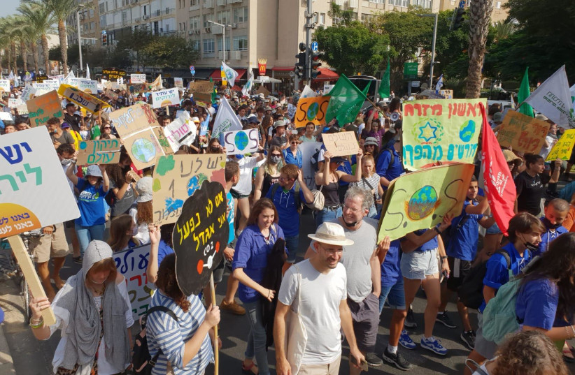  Environmental protection block marching at the climate march in Tel Aviv, October 29, 2021 (photo credit: DROR BOIMEL/THE SOCIETY FOR THE PROTECTION OF NATURE IN ISRAEL)