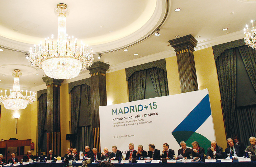  OFFICIALS ATTEND the Madrid+15 Conference in January 2007, one of the events that have taken place over the years to renew peace efforts between Arab states and Israel and commemorate the Madrid Peace Conference.  (photo credit: SUSANA VERA/REUTERS)