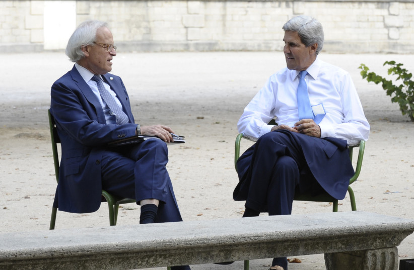 U.S. Secretary of State John Kerry (R) and U.S. Special Envoy for Israeli-Palestinian negotiations Martin Indyk talk in Les Tuilleries in Paris September 8, 2013. (credit: REUTERS/SUSAN WALSH/POOL)