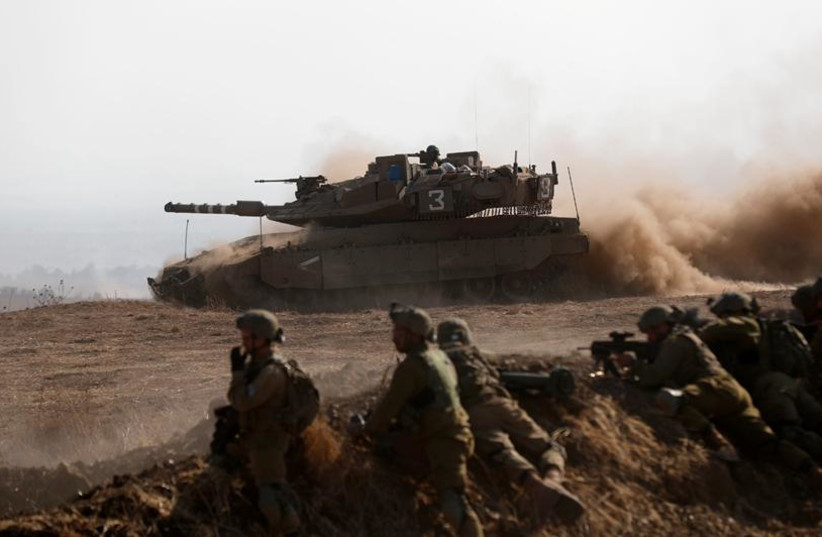IDF soldiers are seen taking part in military drills in Israel's North to simulate a war with Hezbollah. (credit: IDF SPOKESPERSON'S UNIT)
