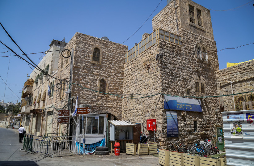  View of a house belong to Jewish settlers in the West bank city Hebron on August 26, 2021. (credit: GERSHON ELINSON/FLASH90)