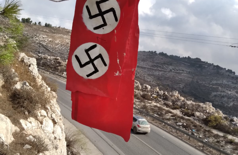  The handmade Nazi flag hung up near the West Bank settlement of Homesh (credit: HOMESH YESHIVA)