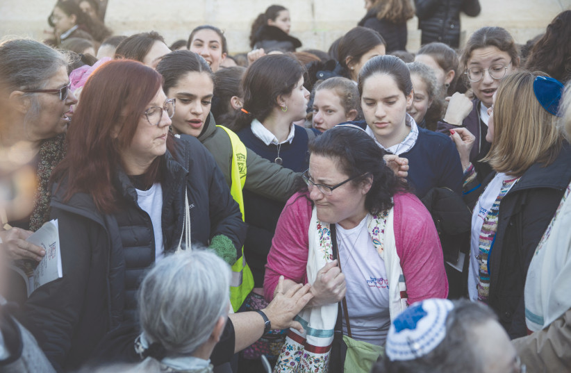 MEMBERS OF the Women of the Wall movement hold Rosh Hodesh prayers at the Western Wall in front of ultra-Orthodox protesters. (credit: HADAS PARUSH/FLASH90)