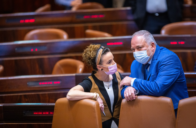  Finance Minister Avigdor Liberman and MK Idit Silman seen during a plenum session and a vote on the state budget at the assembly hall of the Israeli parliament, in Jerusalem on November 3, 2021. (credit: OLIVIER FITOUSSI/FLASH90)