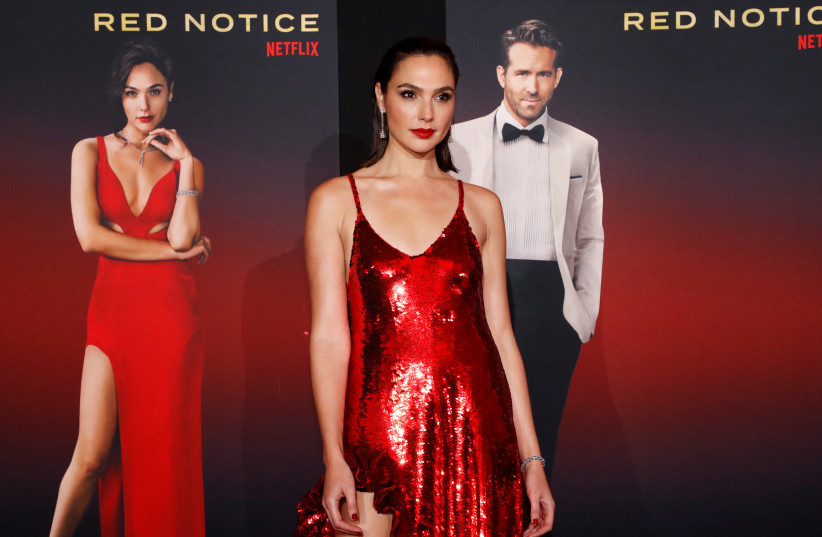  Cast member Gal Gadot attends the premiere for the film "Red Notice" in Los Angeles, California, US, November 3, 2021. (photo credit: REUTERS/MARIO ANZUONI)