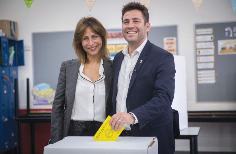  CANDIDATE OFER BERKOVICH and wife Dina cast their ballots in the November 2018  mayoral election. (photo credit: YONATAN SINDEL/FLASH90)