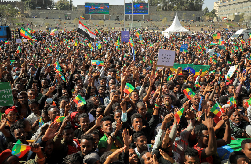 Civilians attend a pro-government rally to denounce what the organisers say is the Tigray People’s Liberation Front (TPLF) and the Western countries' interference in internal affairs of the country, at Meskel Square in Addis Ababa, Ethiopia, November 7, 2021. (photo credit: REUTERS/TIKSA NEGERI)