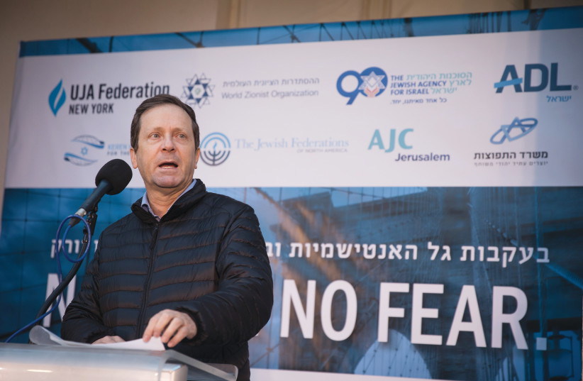  THEN-JEWISH AGENCY chairman Isaac Herzog addresses a rally in Jerusalem last year in solidarity with Jews around the world, following a wave of antisemitic attacks. (photo credit: HADAS PARUSH/FLASH90)