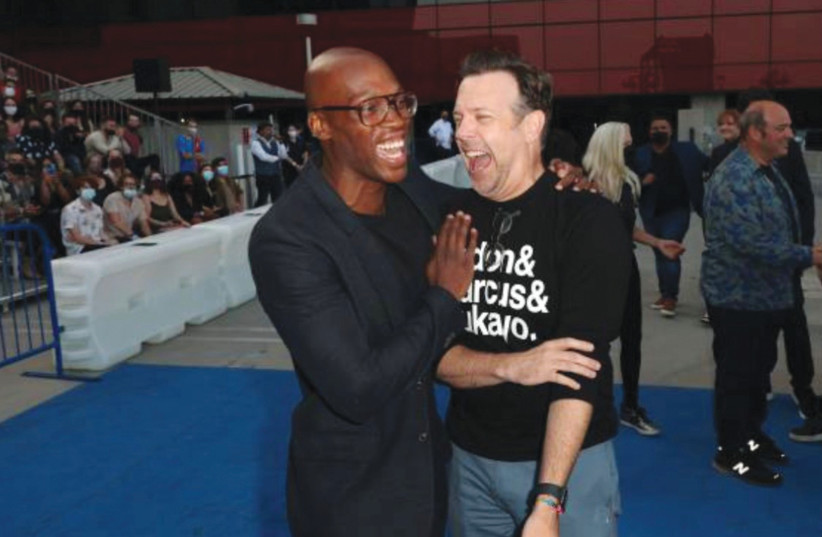  JEUDY-LAMOUR laughs it up with ‘Ted Lasso’ star Jason Sudeikis. (photo credit: ERIC CHARBONNEAU)